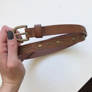 Brown belt with bronze accents